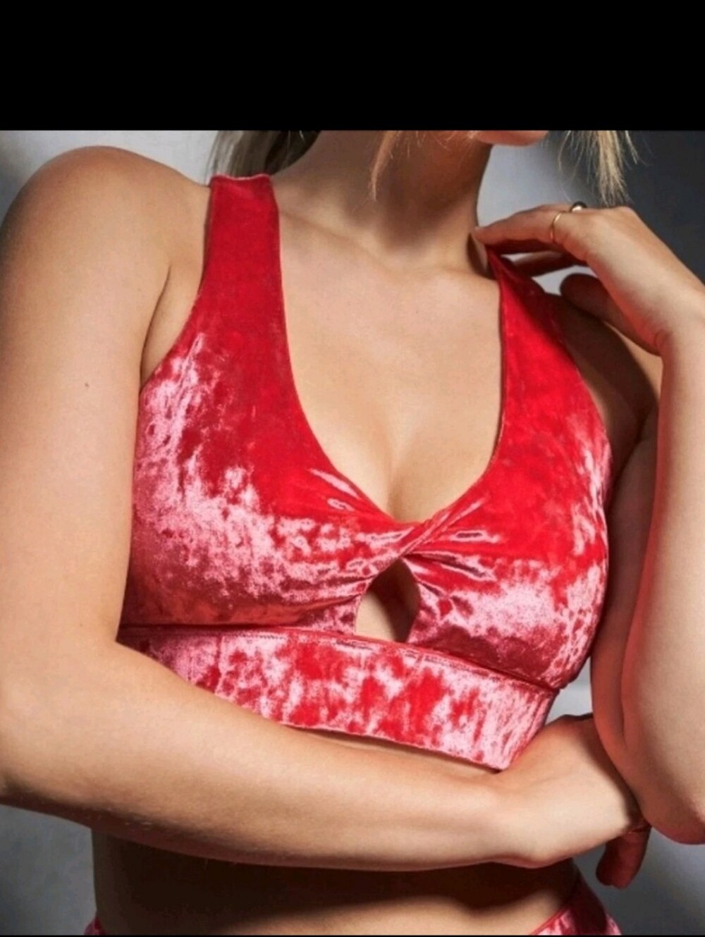 Fabletics Oasis Crushed Velour Twist Sports Bra in Strawberry Red.